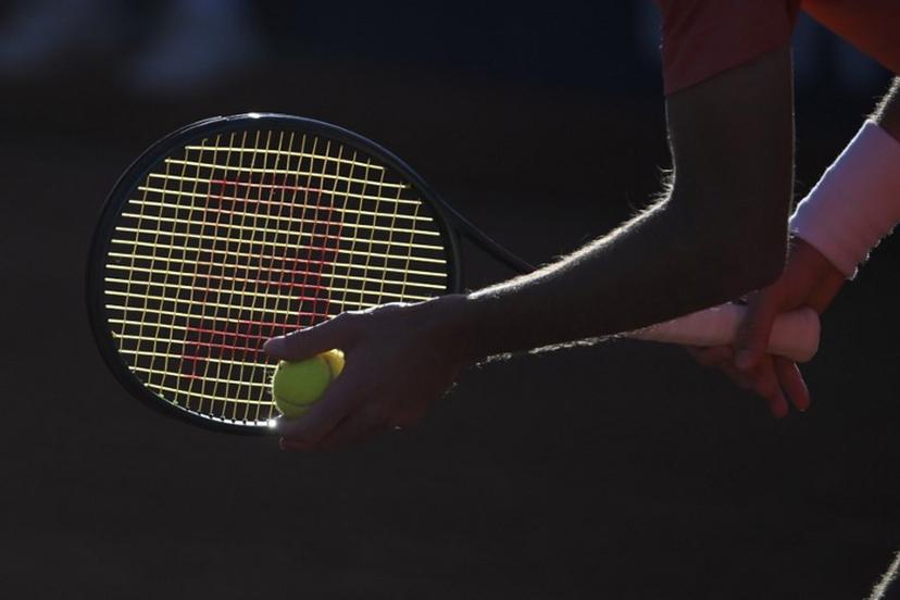 Greece's Stefanos Tsitsipas holds the ball as he prepares to serve to Argentina's Facundo Diaz Acosta during the ATP Barcelona Open "Conde de Godo" tennis tournament singles match at the Real Club de Tenis in Barcelona, on April 19, 2024.  Josep LAGO / AFP