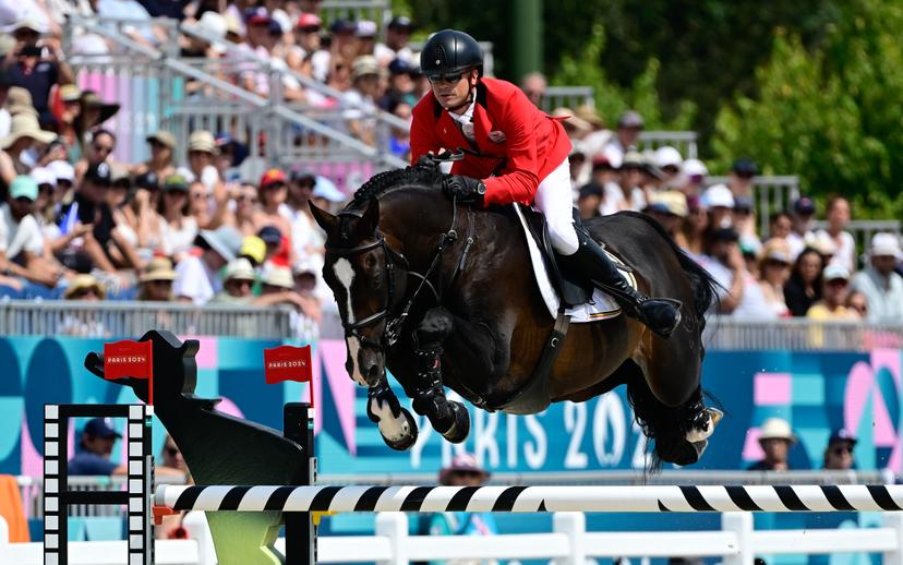 Belgian rider Jerome Guery with horse Quel Homme de Hus pictured in action during the Equestrian Jumping Team final at the Paris 2024 Olympic Games, on Friday 02 August 2024 in Paris, France. The Games of the XXXIII Olympiad are taking place in Paris from 26 July to 11 August. The Belgian delegation counts 165 athletes competing in 21 sports. BELGA PHOTO DIRK WAEM