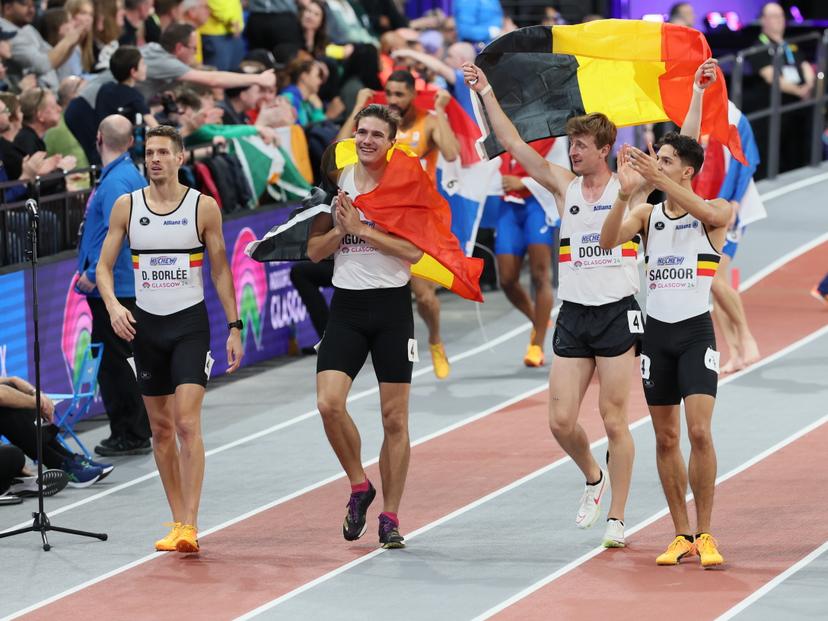 Belgian Dylan Borlee, Belgian Christian Iguacel, Belgian Alexander Doom and Belgian Jonathan Sacoor celebrate after winning the final of the men's 4x400m relay event, on day three of the World Athletics Indoor Championships in Glasgow, Scotland, UK, on Sunday 03 March 2024. The Worlds are taking place from 01 to 03 March 2024. BELGA PHOTO BENOIT DOPPAGNE