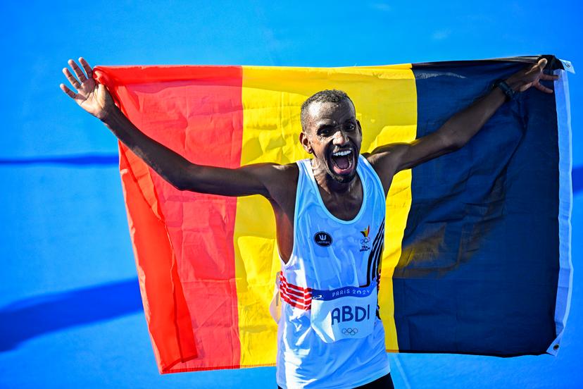 Belgian athlete Bashir Abdi celebrates as he crosses the finish line to win the silver medal of the men's marathon of the athletics competition at the Paris 2024 Olympic Games, on Saturday 10 August 2024 in Paris, France. The Games of the XXXIII Olympiad are taking place in Paris from 26 July to 11 August. The Belgian delegation counts 165 athletes competing in 21 sports. BELGA PHOTO JASPER JACOBS