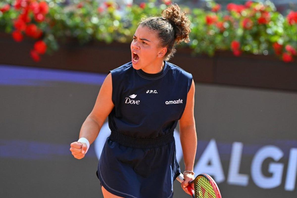 Italy's Jasmine Paolini reacts during the women's singles semi-final match against USA's Peyton Stearns during the WTA Rome Open tennis tournament at Foro Italico in Rome on May 15, 2025.  Andreas SOLARO / AFP