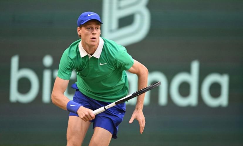 Kazakhstan's Alexander Bublik eyes the ball to Italy's Jannik Sinner in their men's singles tennis match during the Halle Open ATP tennis tournament in Halle, on June 19, 2025.  CARMEN JASPERSEN / AFP