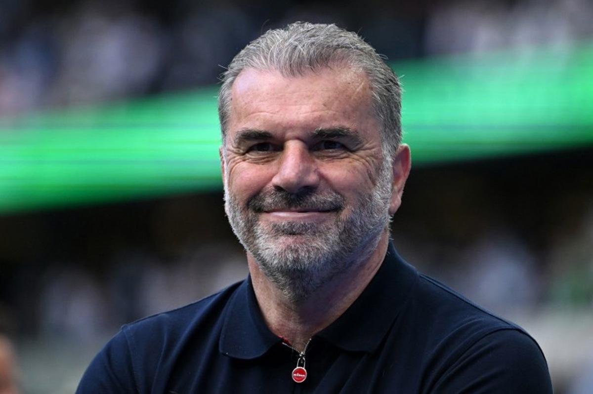 Tottenham Hotspur's Greek-Australian Head Coach Ange Postecoglou applauds the fans following the English Premier League football match between Tottenham Hotspur and Brighton and Hove Albion at the Tottenham Hotspur Stadium in London, on May 25, 2025.  JUSTIN TALLIS / AFP