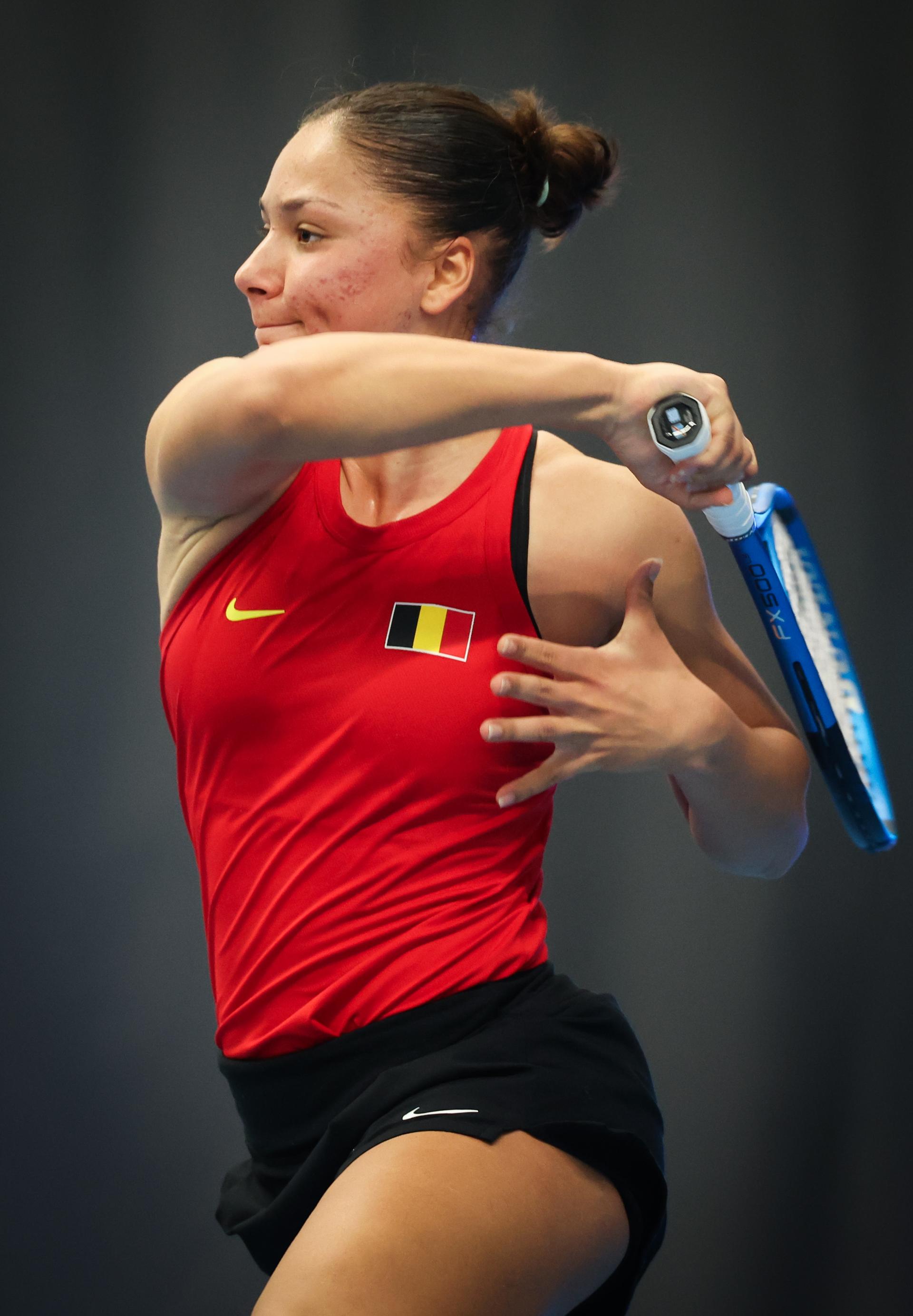 Belgian Sofia Costoulas pictured in action during a tennis match between Belgian Costoulas and Hungarian Toth, in the meeting between Belgium and Hungary in the pool phase of the Europe/Africa Group I of the Billie Jean King Cup tennis, in Vilnius, Lithuania on Wednesday 09 April 2025. PHOTO VIRGINIE LEFOUR PHOTO VIRGINIE LEFOUR