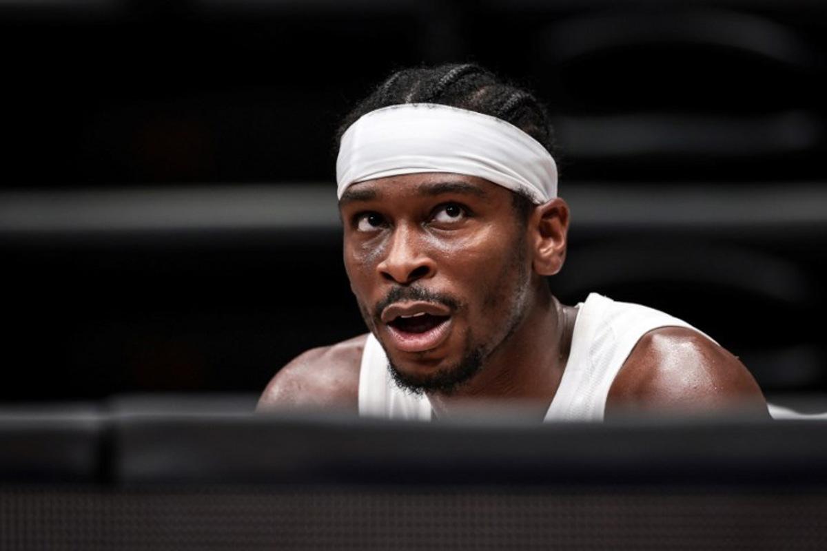 Canada's Shai Gilgeous-Alexander looks at the score board during the FIBA Basketball World Cup group H match between Canada and Latvia at Indonesia Arena in Jakarta on August 29, 2023.   Yasuyoshi CHIBA / AFP