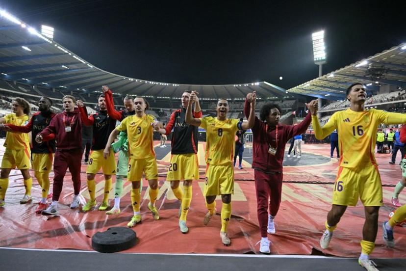 Belgium's players celebrate their victory at the end of the FIFA World Cup 2026 Group J European qualification football match between Belgium and Wales at the King Baudouin Stadium in Brussels, on June 9, 2025.  NICOLAS TUCAT / AFP