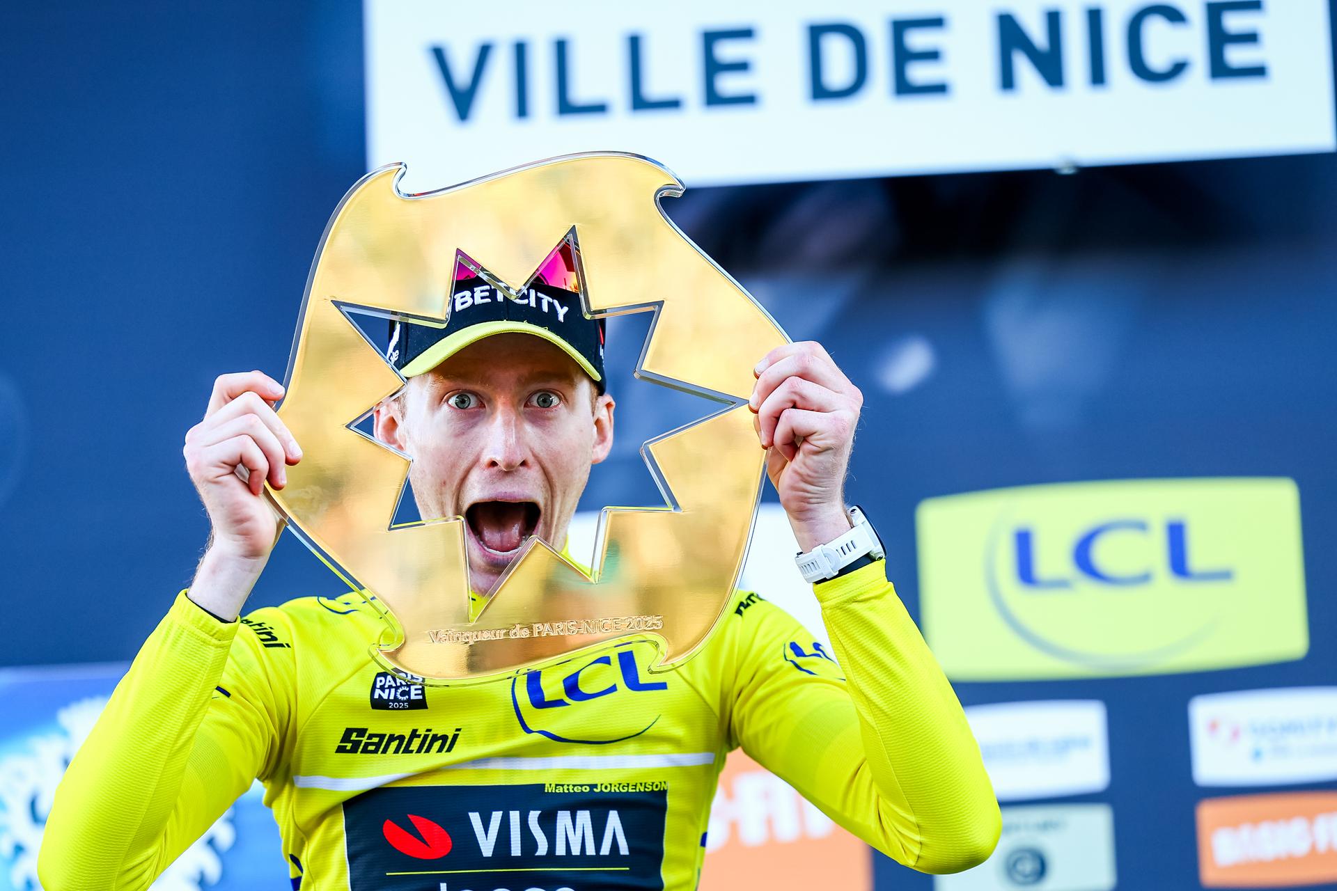 American Matteo Jorgenson of Team Visma-Lease a Bike celebrates on the podium after winning stage eight of the 83th edition of the Paris-Nice cycling race, 119,9 km from Nice to Nice, France, Sunday 16 March 2025. BELGA PHOTO DAVID PINTENS
