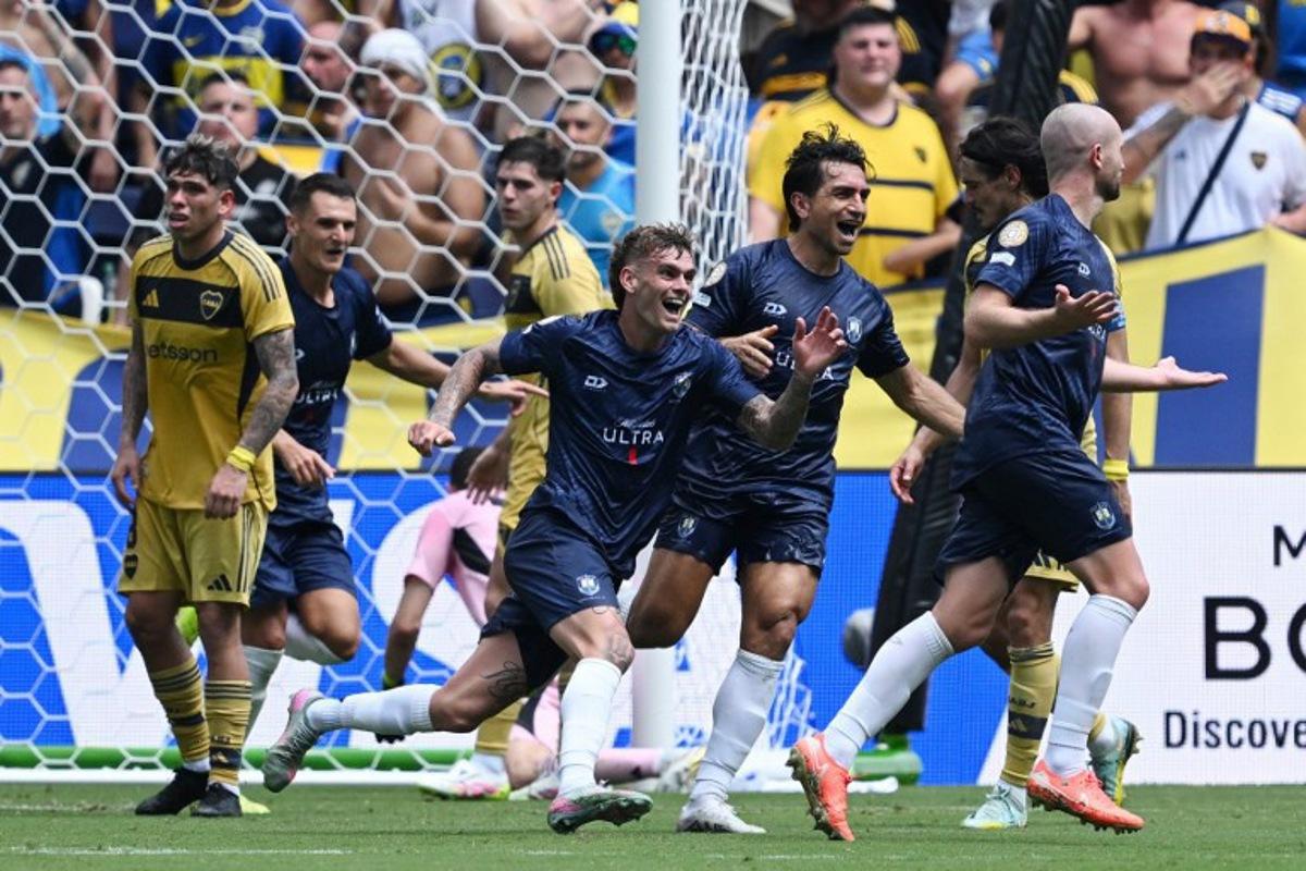 Auckland City's New Zealander defender #04 Christian Gray (R) celebrates scoring his team's first goal during the FIFA Club World Cup 2025 Group C football match between New Zealand's Auckland City and Argentina's Boca Juniors at the Geodis Park stadium in Nashville on June 24, 2025.  Federico PARRA / AFP