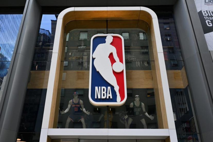 The NBA logo is seen outside an NBA fan store in New York on July 8, 2024.  ANGELA WEISS / AFP