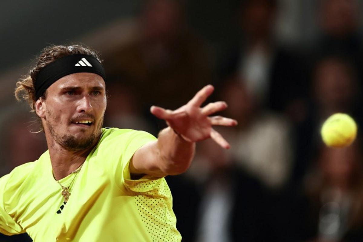 Germany's Alexander Zverev eyes the ball during his men's singles quarter-final match against Serbia's Novak Djokovic on day 11 of the French Open tennis tournament on Court Philippe-Chatrier at the Roland-Garros Complex in Paris on June 4, 2025.  Thibaud MORITZ / AFP