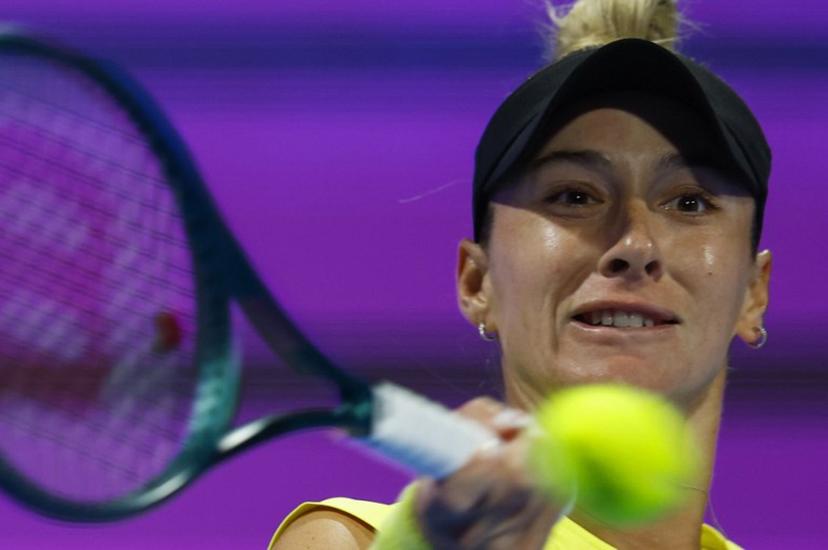 McCartney Kessler of the USA returns the ball to Ons Jabeur of Tunisia during their 2025 WTA Qatar Open match at the Khalifa International Tennis Complex in Doha on February 10, 2025.  KARIM JAAFAR / AFP