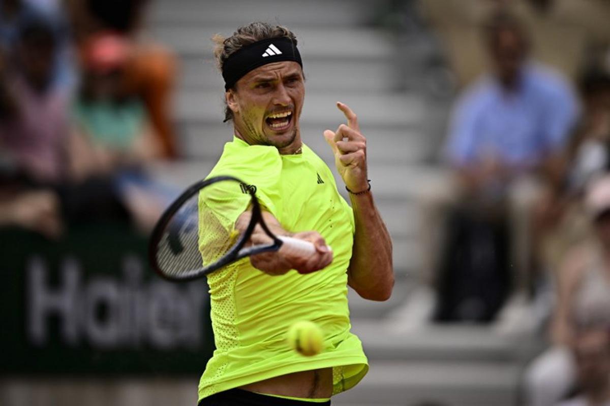 Germany's Alexander Zverev plays a forehand return to Netherlands' Jesper De Jong during their men's singles match on day 5 of the French Open tennis tournament on Court Simonne-Mathieu at the Roland-Garros Complex in Paris on May 29, 2025.  JULIEN DE ROSA / AFP