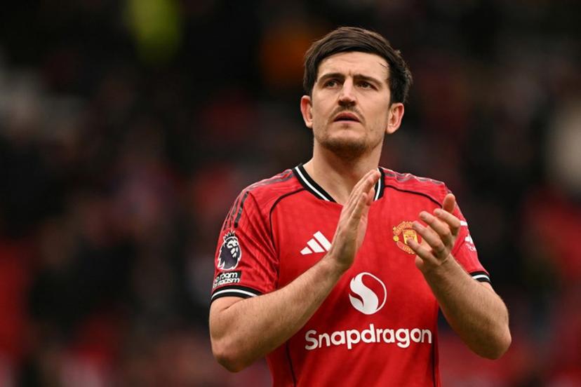 Manchester United's English defender #05 Harry Maguire applauds at the end of the English Premier League football match between Manchester United and Aston Villa at Old Trafford in Manchester, north west England, on March 15, 2026.  Oli SCARFF / AFP
