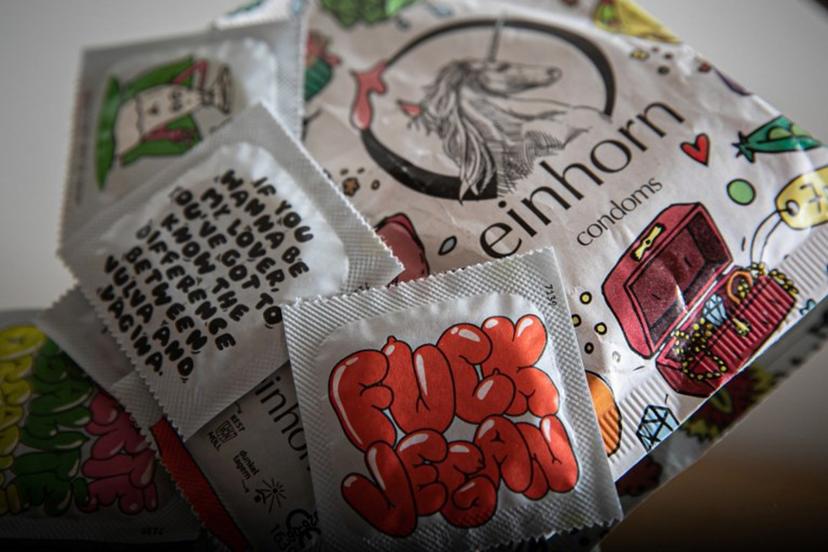 This photograph taken on April 25, 2023, in Courseulles-sur-Mer, shows packets of condoms.   Lou BENOIST / AFP