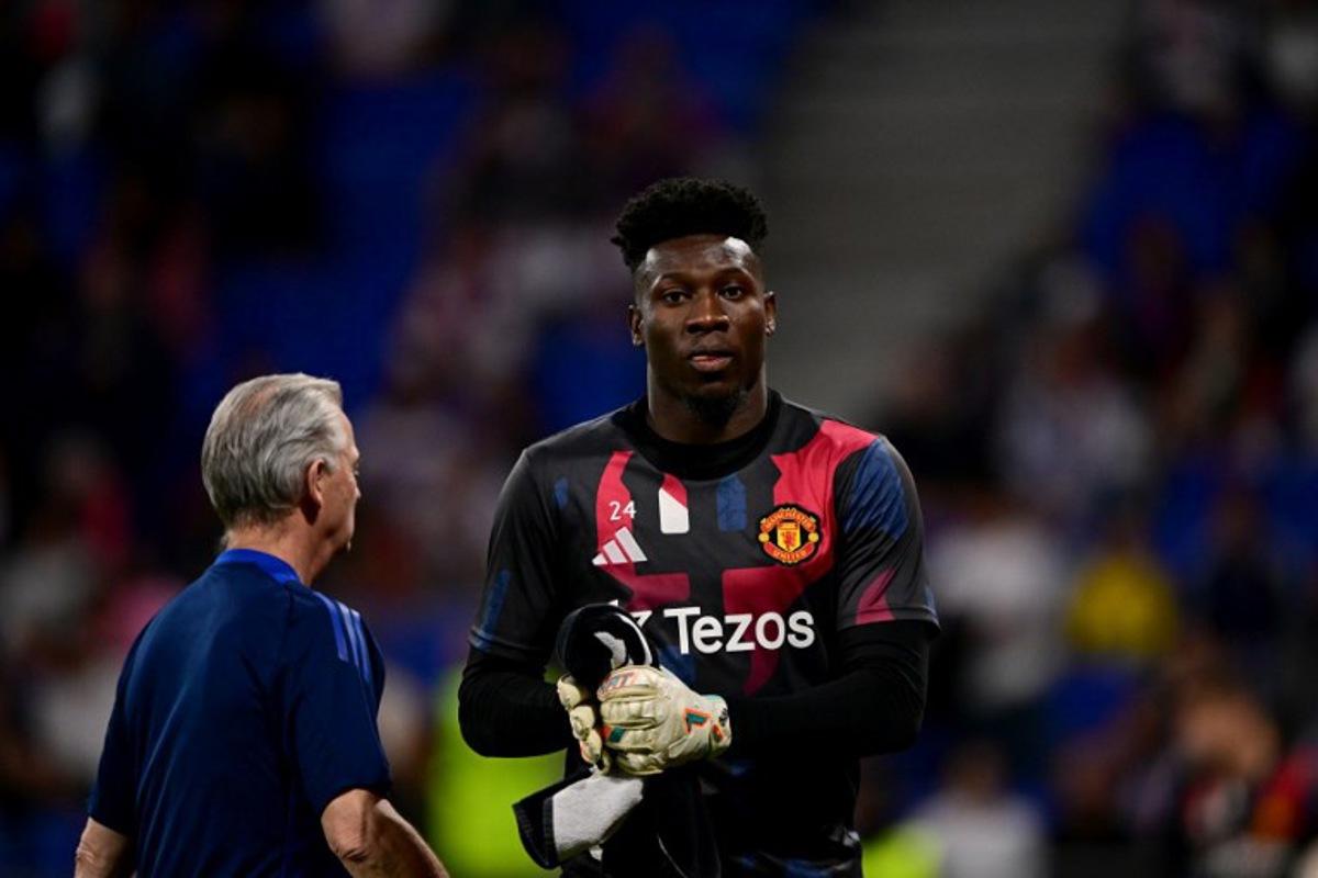 Manchester United's Cameroonian goalkeeper #24 Andre Onana looks on during the UEFA Europa League Quarter final first leg football match between Olympique Lyonnais (OL) and Manchester United at the Parc Olympique Lyonnais Groupama stadium in Decines-Charpieu, central-eastern France, on April 10, 2025.  Olivier CHASSIGNOLE / AFP