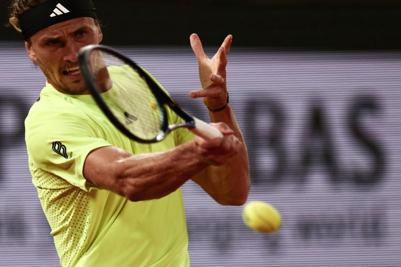 Germany's Alexander Zverev plays a forehand return to Serbia's Novak Djokovic during their men's singles quarter-final match on day 11 of the French Open tennis tournament on Court Philippe-Chatrier at the Roland-Garros Complex in Paris on June 4, 2025.  Thibaud MORITZ / AFP