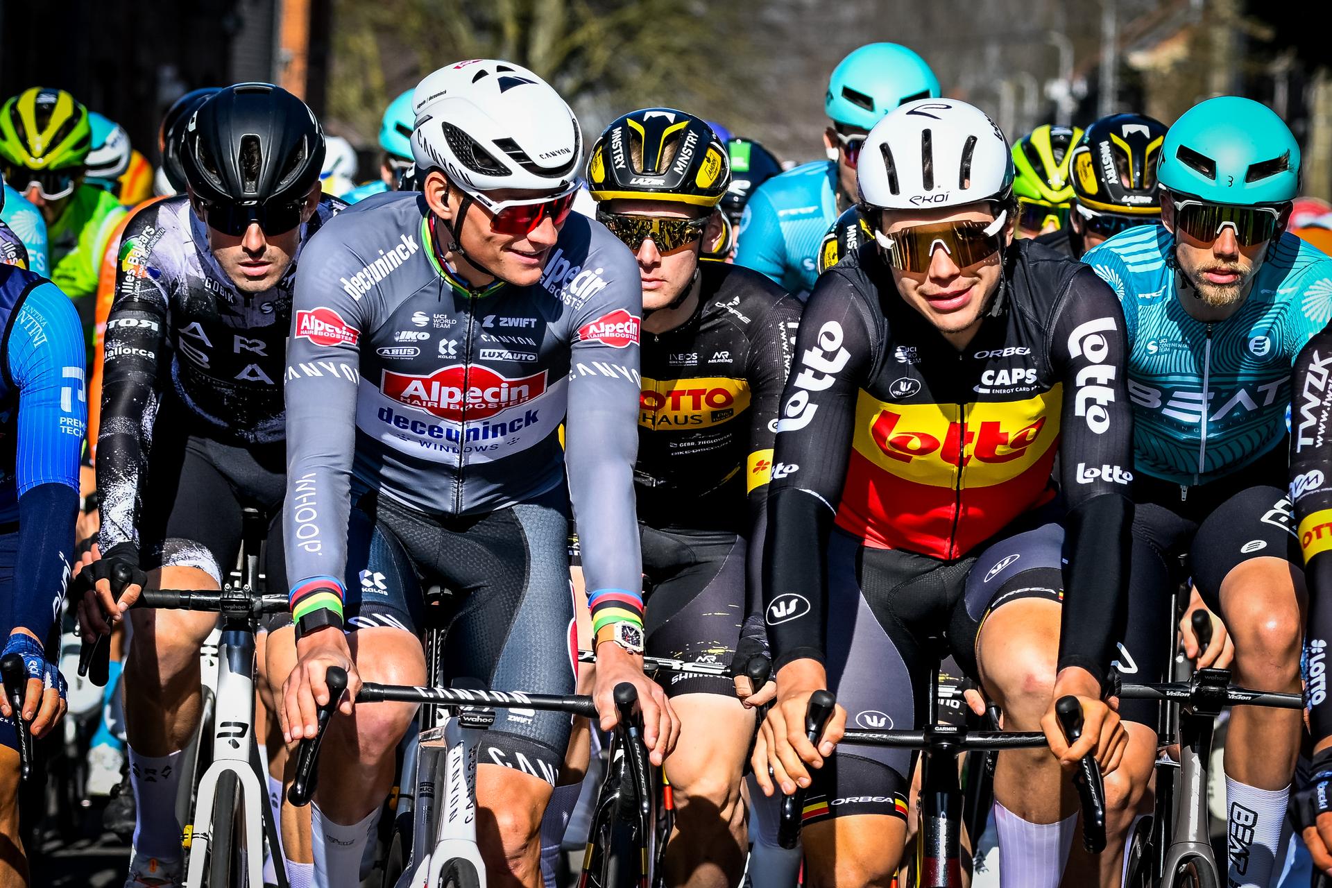 Dutch Mathieu van der Poel of Alpecin-Deceuninck and Belgian Arnaud De Lie of Lotto Cycling Team pictured at the start of the 'Ename Samyn Classic' one day cycling race, 199,1km from Quaregnon to Dour on Tuesday 04 March 2025. BELGA PHOTO TOM GOYVAERTS