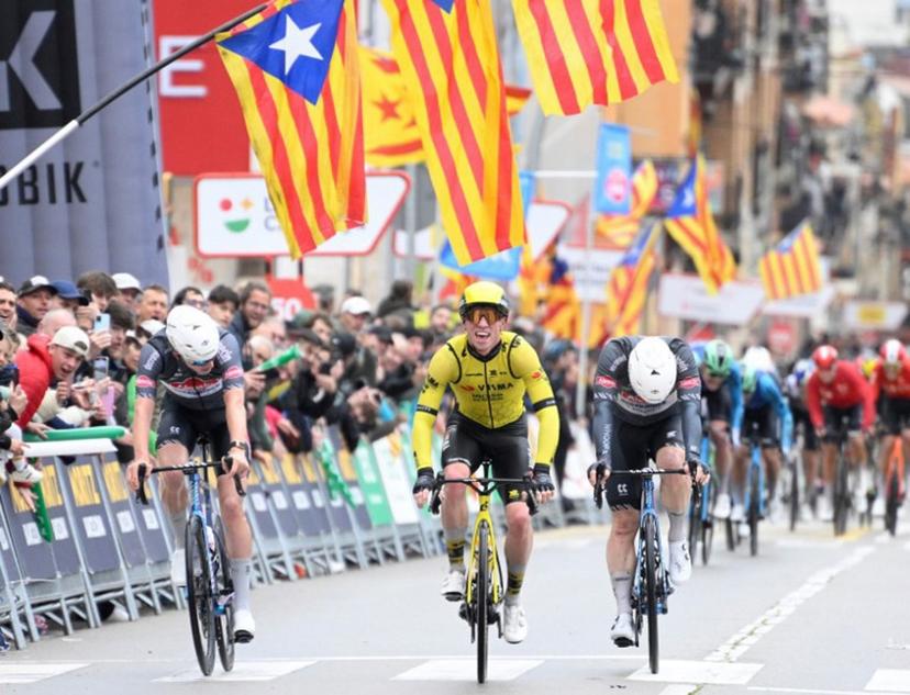 (From L) Team Alpecin's Tibor del Grosso, Team Visma's British rider James Matthew Brennan and Team Alpecin's Kaden Groves compete prior crossing the finish line of the first stage of the 2025 Volta a Catalonya cycling tour of Catalonya, a 178,3 km loop starting and finishing in Sant Feliu de Guixols, on March 24, 2025.  Josep LAGO / AFP