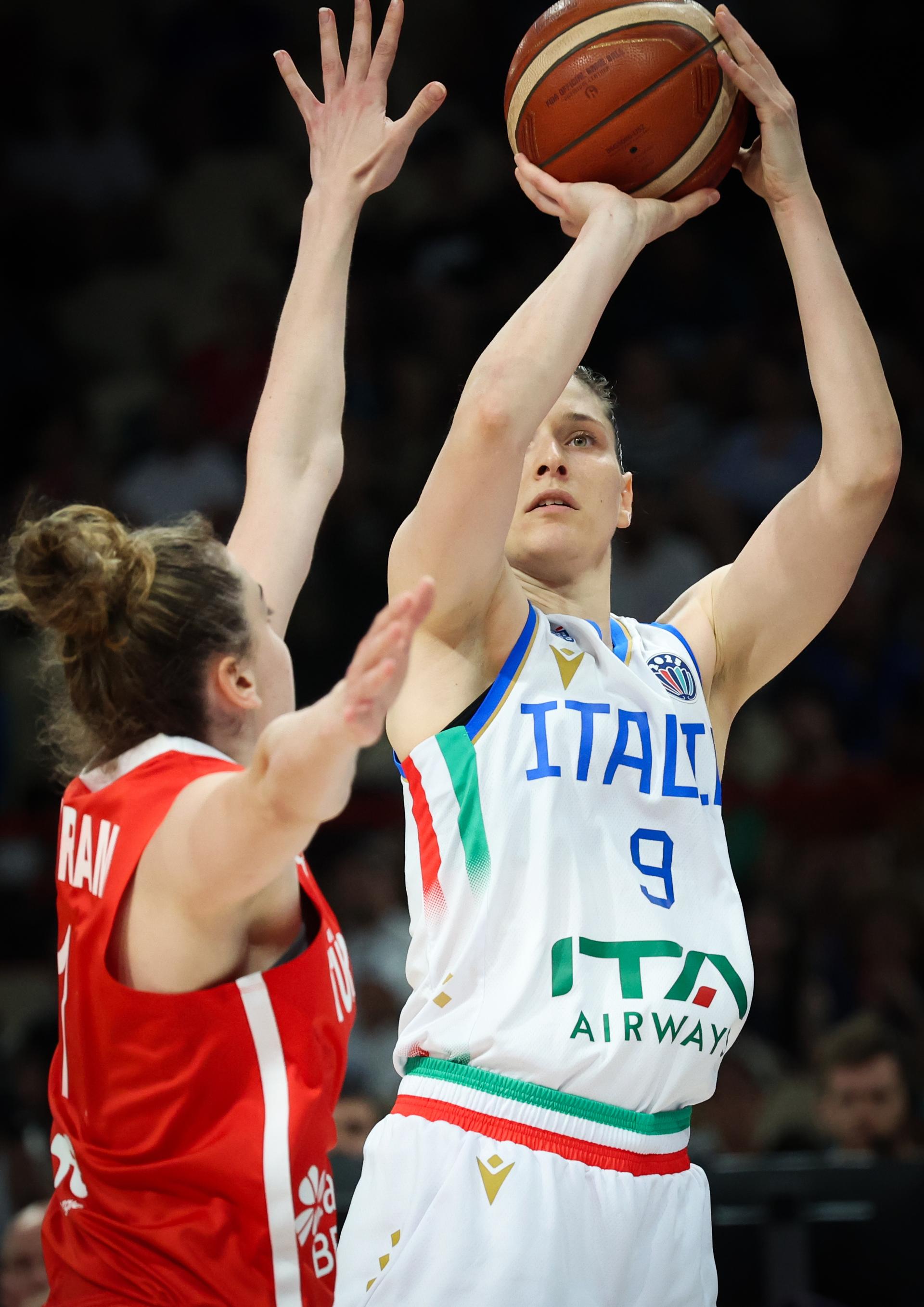 Turkish Elif Bayram and Italian Cecilia Zandalasini fight for the ball during a basketball match between Italy and Turkey, in the quarterfinals of the FIBA Women's EuroBasket tournament, Tuesday 24 June 2025 in Piraeus, Greece. BELGA PHOTO VIRGINIE LEFOUR
