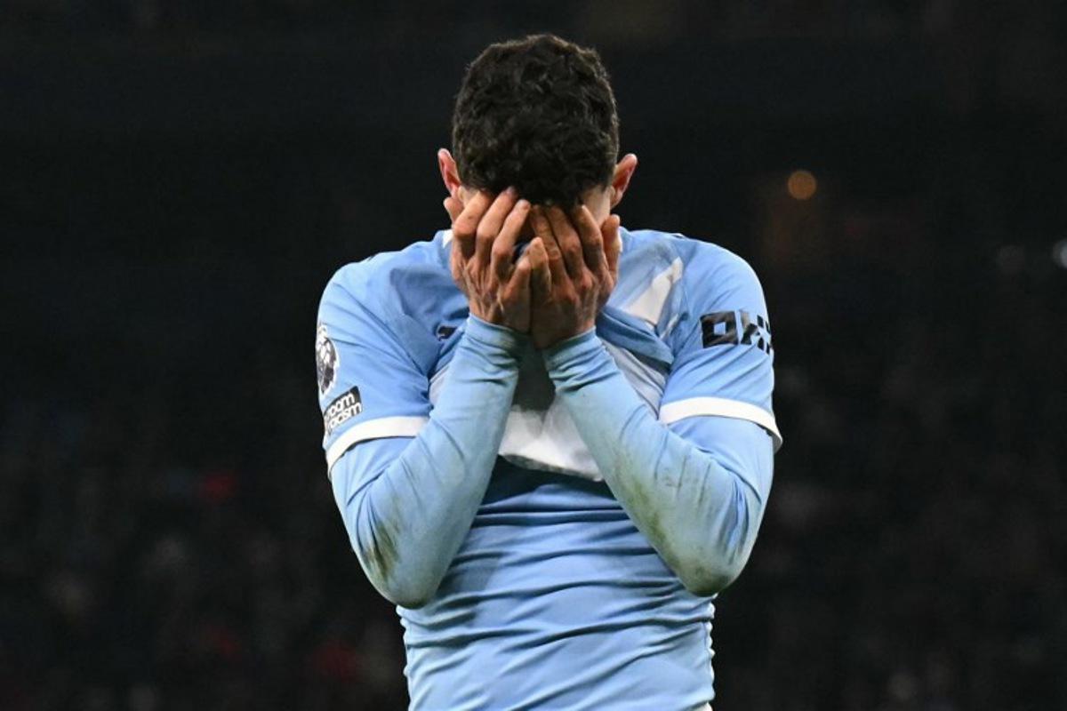 Manchester City's English midfielder #47 Phil Foden reacts to a missed chance during the English Premier League football match between Manchester City and Chelsea at the Etihad Stadium in Manchester, north west England, on January 4, 2026.  Oli SCARFF / AFP