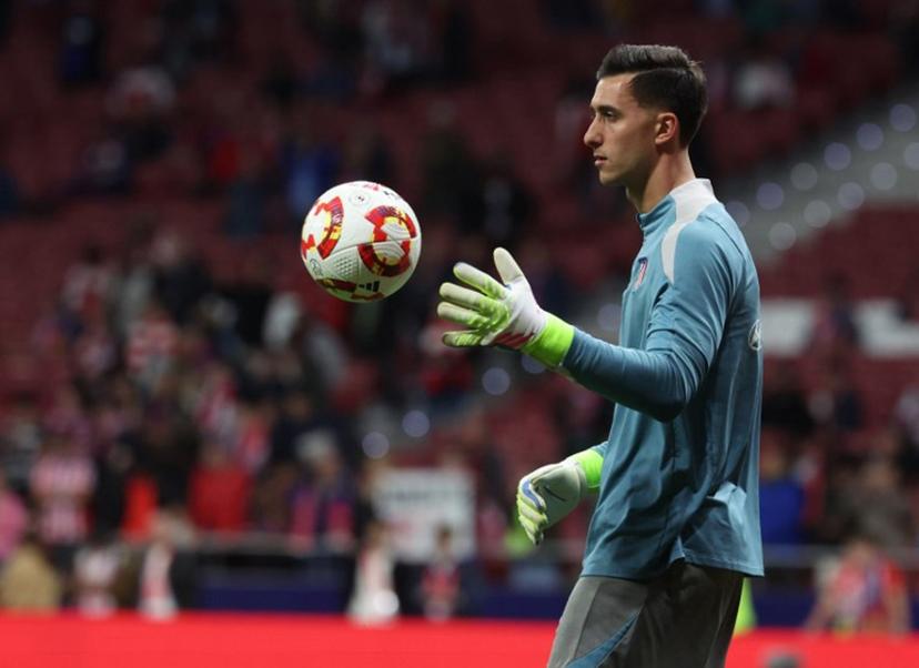 Atletico Madrid's Argentine goalkeeper #01 Juan Musso warms up before the Spanish Copa del Rey (King's Cup) semi-final second leg football match between Club Atletico de Madrid and FC Barcelona at Metropolitano Stadium in Madrid on April 2, 2025.  Pierre-Philippe MARCOU / AFP