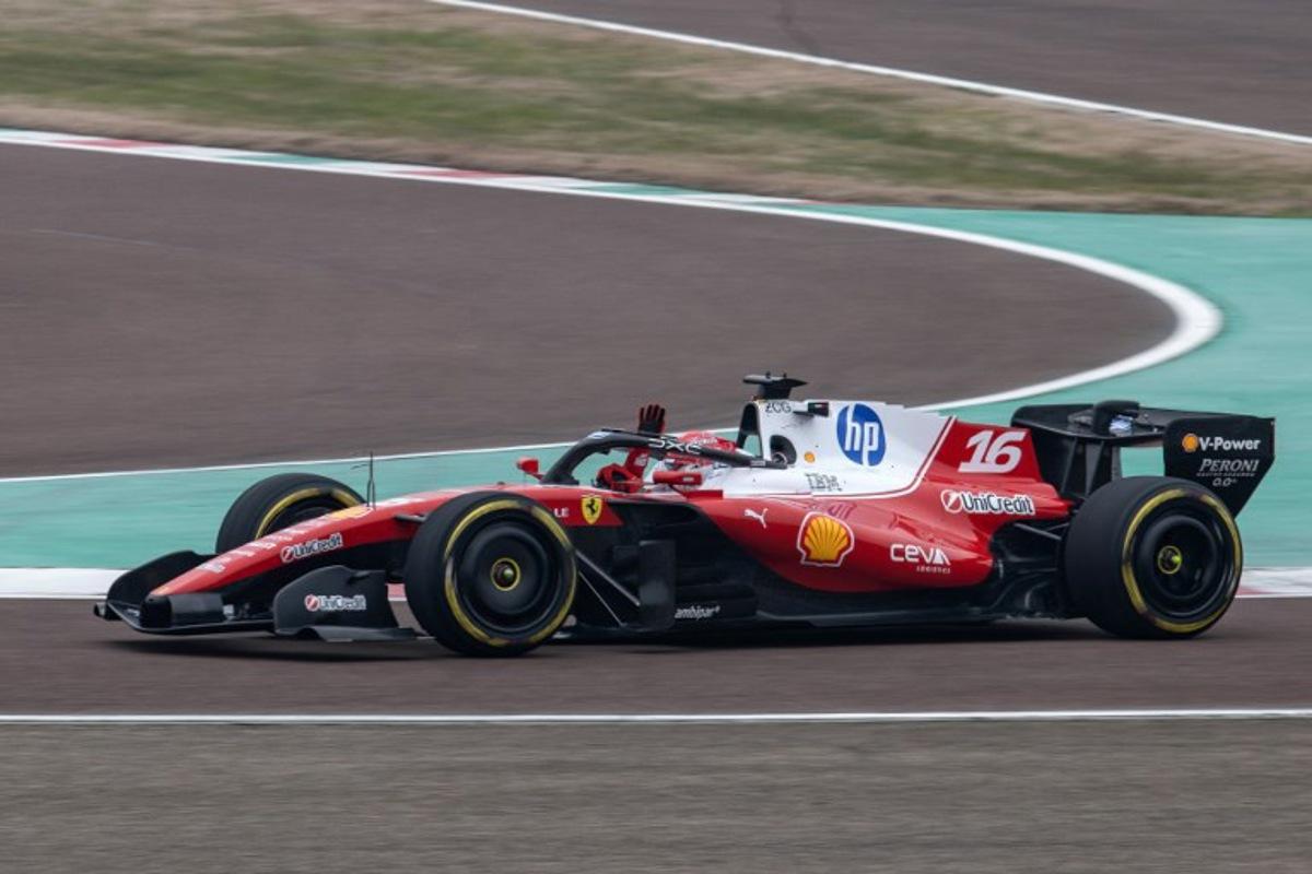 Monaco's Charles Leclerc (16) waves to fans while he steers the new Formula 1 Ferrari SF-26 during tests at the Fiorano Circuit in Fiorano Modenese, on January 23, 2026.  Federico SCOPPA / AFP