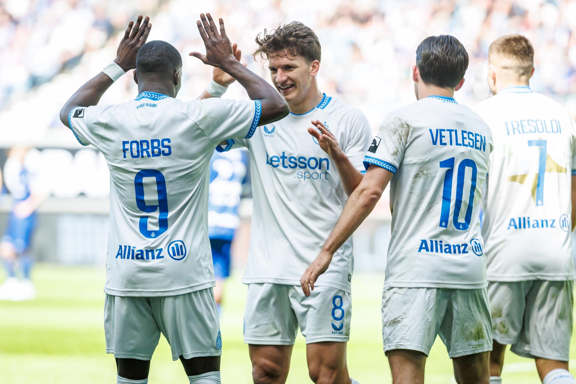 Club's Hugo Vetlesen, Club's Christos Tzolis and Club's Nicolo Tresoldi celebrate after scoring during a soccer match between KAA Gent and Club Brugge, Sunday 26 April 2026 in Gent, on the fifth day of the Champion's Play-offs of the 2025-2026 'Jupiler Pro League' first division of the Belgian championship. BELGA PHOTO KURT DESPLENTER