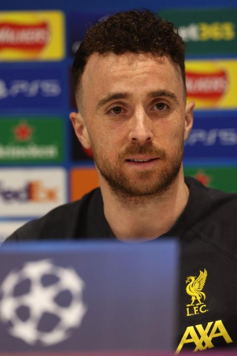 Liverpool's Portuguese striker #20 Diogo Jota attends a press conference at Anfield stadium in Liverpool, north-west England, on March 10, 2025, on the eve of their UEFA Champions League football match against Paris Saint Germain.  Paul Currie / AFP