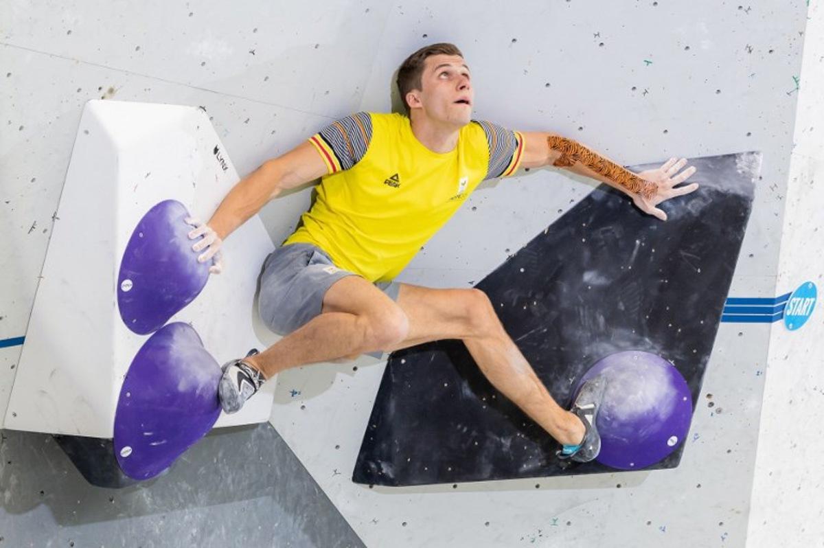 Nicolas Collin of Belgium competes during the men Boulder competition for the IFSC Climbing World Cup in Innsbruck, on June 16, 2023.  Johann GRODER / APA / AFP