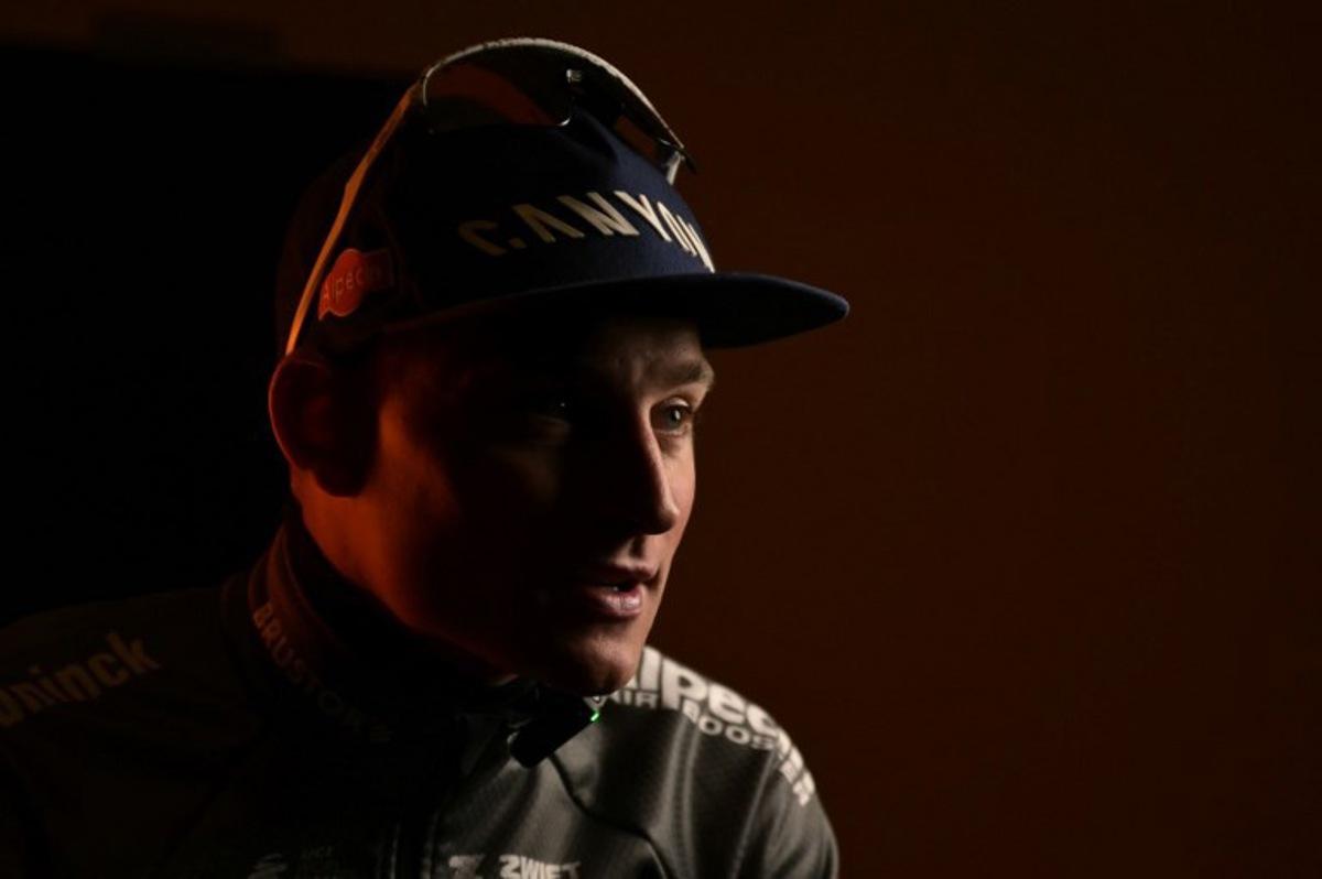 Dutch Mathieu Van Der Poel of team Alpecin-Deceuninck, winner, poses for a portrait after the podium ceremony of the Milan - Sanremo one-day classic cycling race, on March 22, 2025. Dutch Mathieu Van Der Poel of team Alpecin-Deceuninck won the race ahead of Team Ineos' Italian rider Filippo Ganna and Team UAE's Slovenian rider Tadej Pogacar, third.  Marco BERTORELLO / AFP