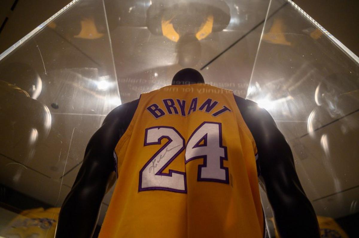 A jersey that belonged to late basketball star Kobe Bryant, expected to fetch between 5-7 million USD, is displayed at Sotheby's auction house in New York on February 1, 2023.  Ed JONES / AFP