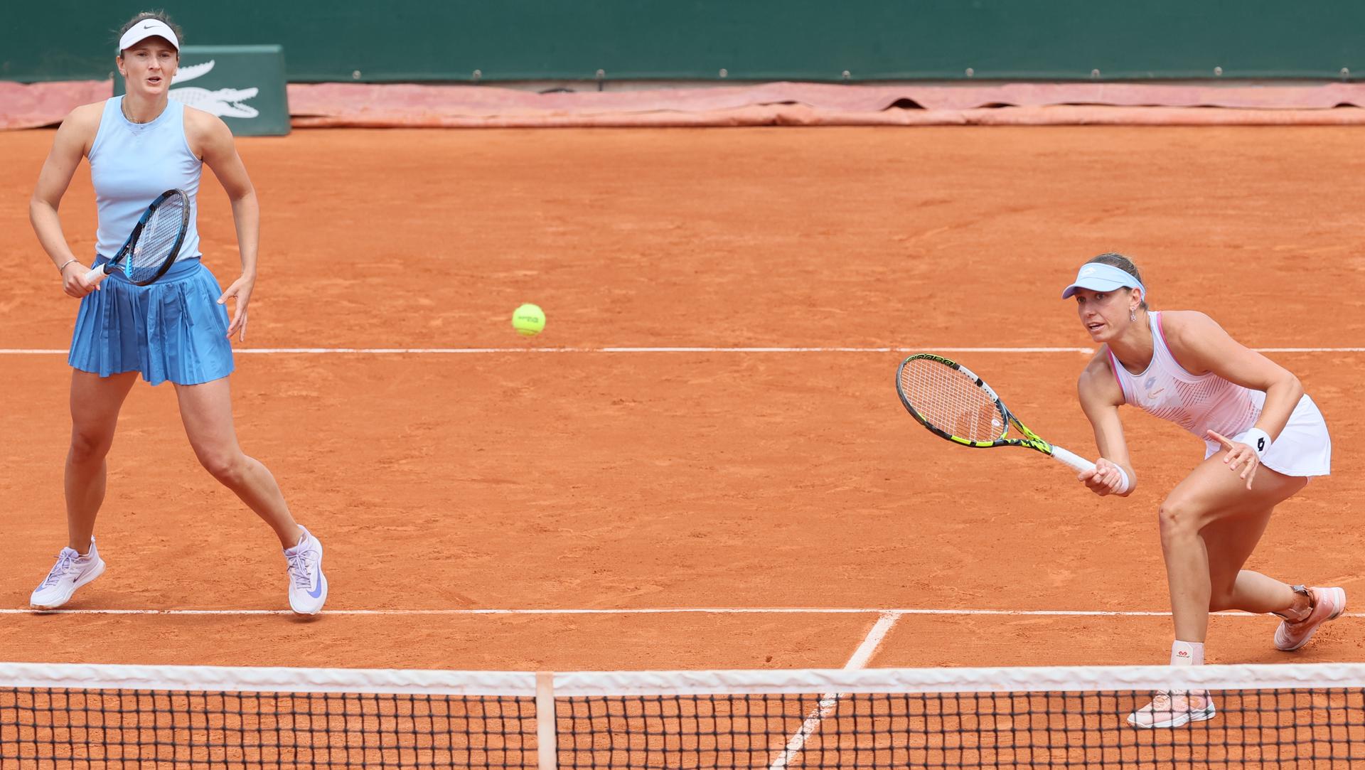 Romanian Irina-Camelia Begu and Belgian Yanina Wickmayer pictured in action during a doubles tennis match between Belgian-Romanian pair Wickmayer-Begu and Russian-Czech pair Rakhimova-Siskova, in the third round of the women's doubles at the Roland Garros Grand Slam tennis tournament, Monday 02 June 2025 in Paris, France. The 2025 edition of Roland Garros takes place from May 25th to June 8th 2025. BELGA PHOTO BENOIT DOPPAGNE
