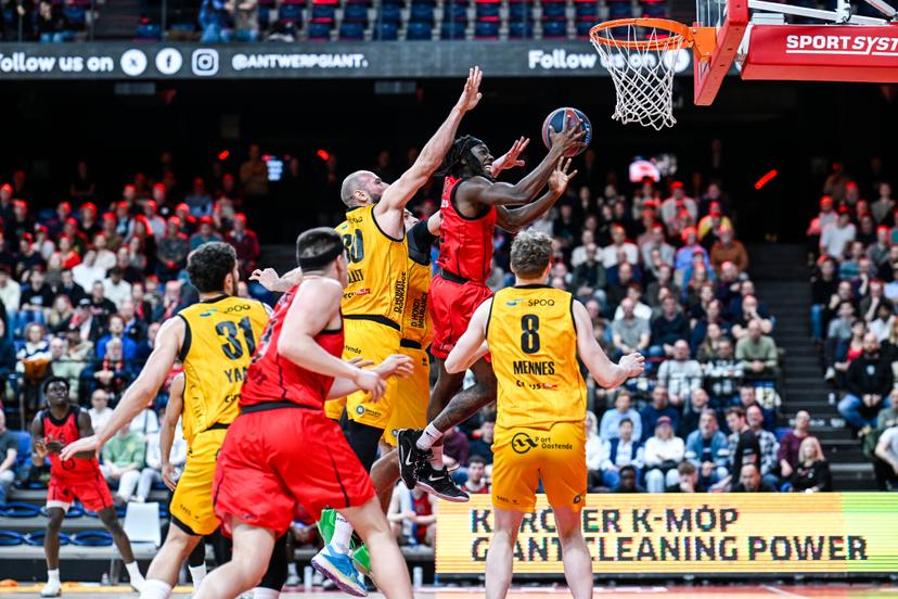 Oostende's Pierre-Antoine Gillet and Antwerp's Rasheed Bello pictured in action during a basketball match between Antwerp Giants and BC Oostende, Tuesday 10 March 2026 in Merksem, Antwerp, on day 22 of the 'BNXT League' Belgian/ Dutch first division basket championship. BELGA PHOTO TOM GOYVAERTS