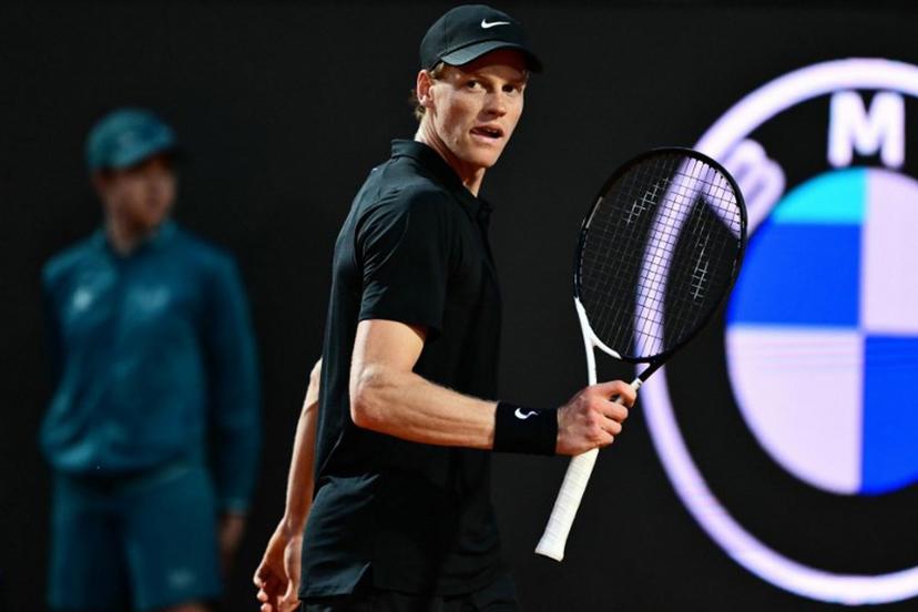 Italy's Jannik Sinner reacts after a point to Argentina's Mariano Navone during their men's singles match of the ATP Rome Open tennis tournament at Foro Italico in Rome on May 10, 2025.  Marco BERTORELLO / AFP