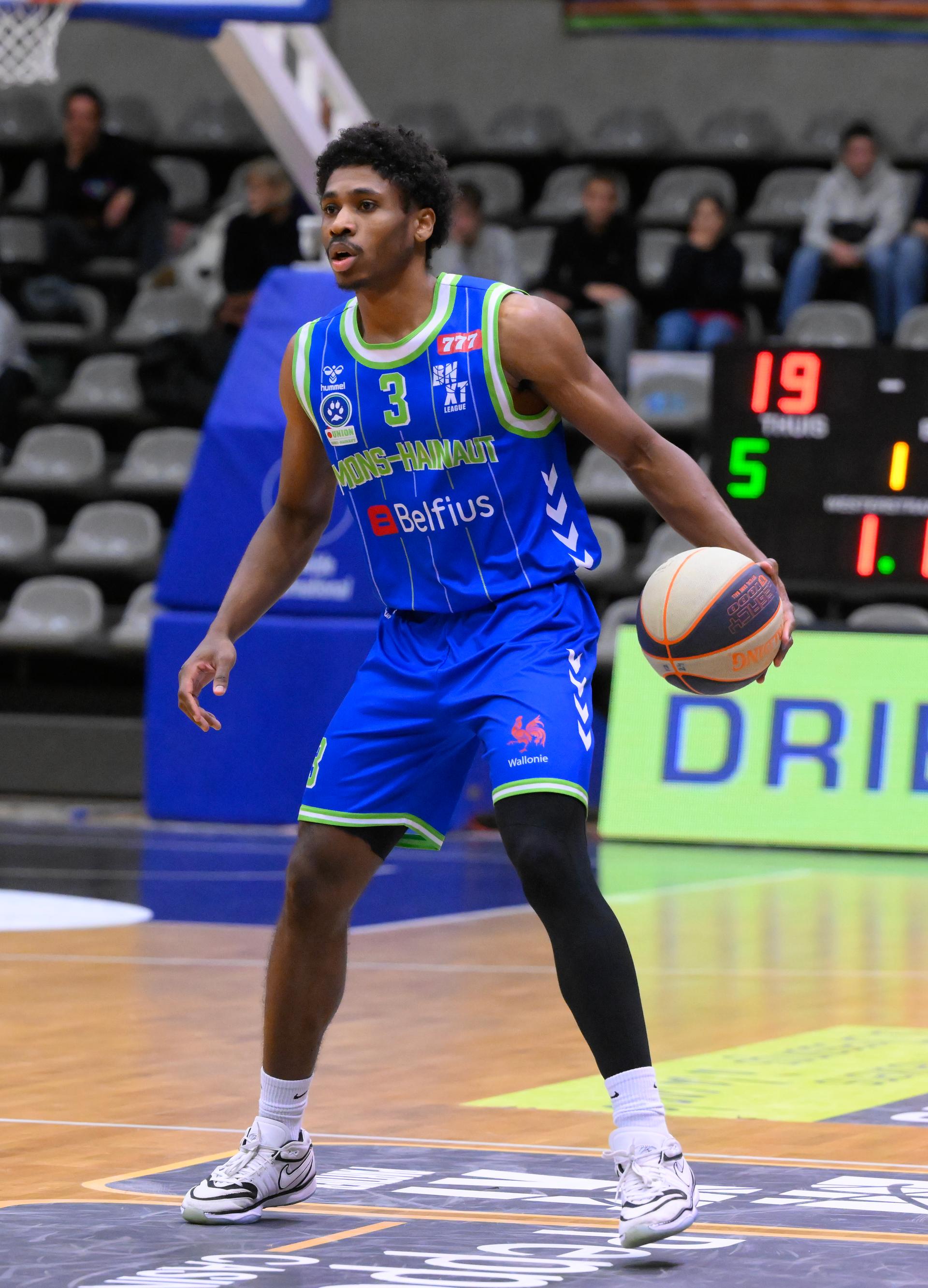 Mons' Marquise Moore controls the ball during a basketball match between Leuven Bears and Mons-Hainaut, Saturday 07 December 2024 in Leuven, on day 14 of the 'BNXT League' Belgian/ Dutch first division basket championship. BELGA PHOTO JOHN THYS