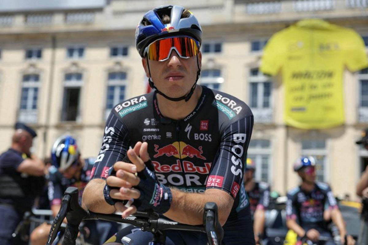 Red Bull - BORA - hansgrohe team's Dutch rider Danny Van Poppel awaits the start of the 6th stage of the 111th edition of the Tour de France cycling race, 163,5 km between Macon and Dijon, on July 4, 2024.  Thomas SAMSON / AFP