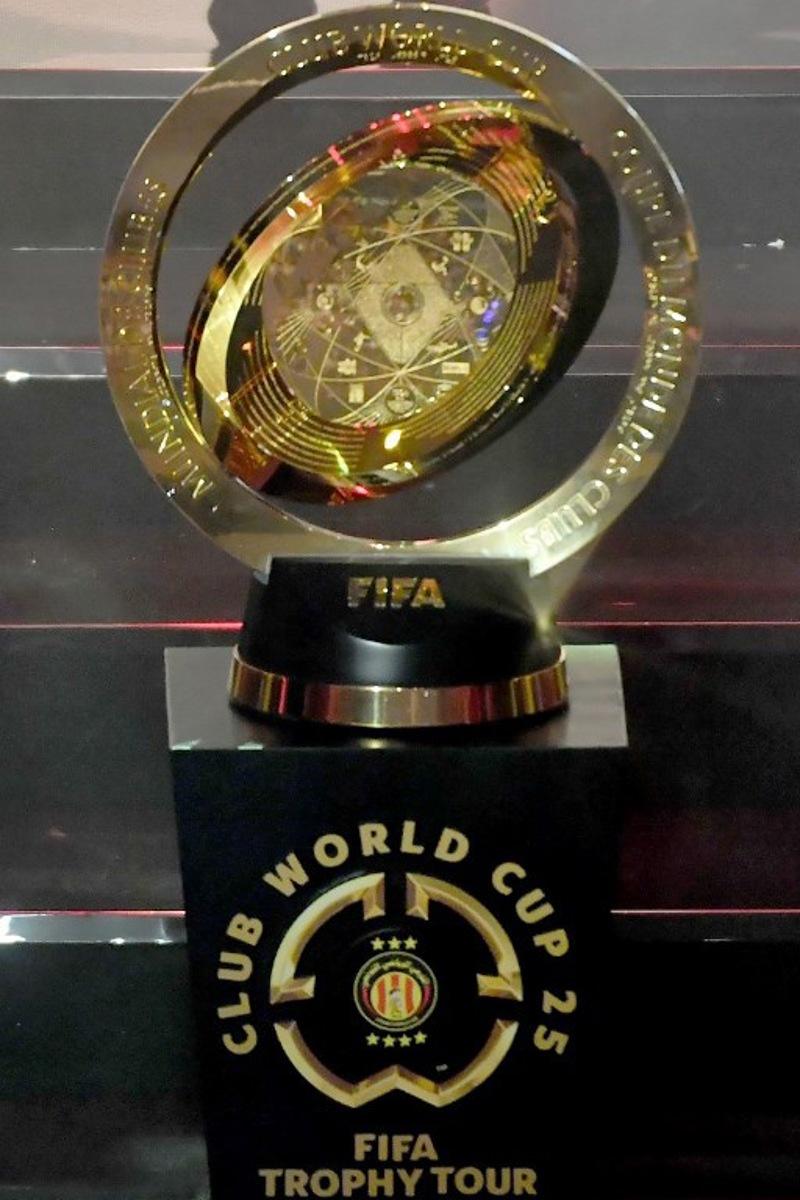 The FIFA Club World Cup trophy is presented during a ceremony organised by Tunisian club Esperance de Tunis in Tunis on February 15, 2025. Tunisia's Esperance is one of the clubs taking part in the 2025 FIFA Club World Cup championship in June in the United States. FETHI BELAID / AFP