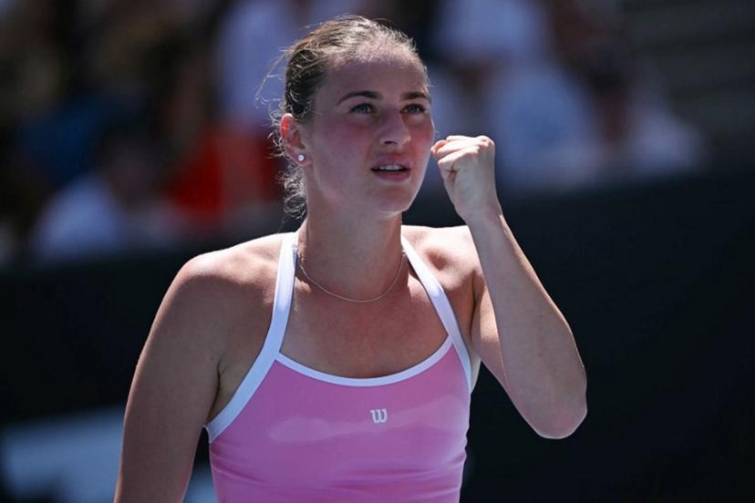 Ukraine's Marta Kostyuk reacts after a point against France's Elsa Jacquemot during their women's singles match on day one of the Australian Open tennis tournament in Melbourne on January 18, 2026.  WILLIAM WEST / AFP