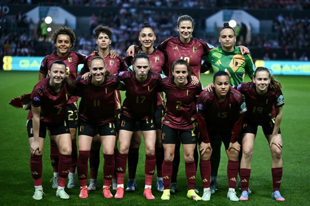 (front row from L to R) Belgium's forward #07 Hannah Eurlings, Belgium's midfielder #11 Janice Cayman  Belgium's forward #17 Jill Janssens, Belgium's defender #02 Davina Philtjens, Belgium's forward #15 Mariam Abdulai Toloba, Belgium's midfielder #19 Jarne Teulings (back row from L to R) Belgium's midfielder #23 Kassandra Missipo, Belgium's defender #05 Isabelle Iliano, Belgium's defender #04 Amber Tysiak, Belgium's midfielder #10 Justine Vanhaevermaet and Belgium's goalkeeper #01 Nicky Evrard pose for team photo during the UEFA Women's Nations League Group A3 football match between England and Belgium at Ashton Gate stadium, in Bristol, western England, on April 4, 2025.  Ben STANSALL / AFP