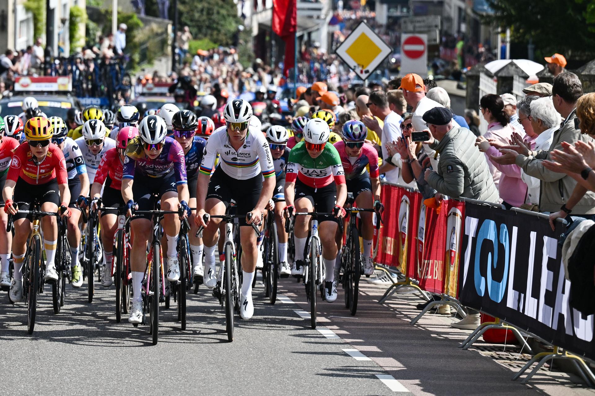 Dutch Mischa Bredewold of SD Worx-Protime and Belgian Lotte Kopecky of SD Worx-Protime pictured in action during the women elite 'Amstel Gold Race' one day cycling race, 157,4 km from Maastricht to Valkenburg, The Netherlands, Sunday 20 April 2025. BELGA POOL LUC CLAESSEN