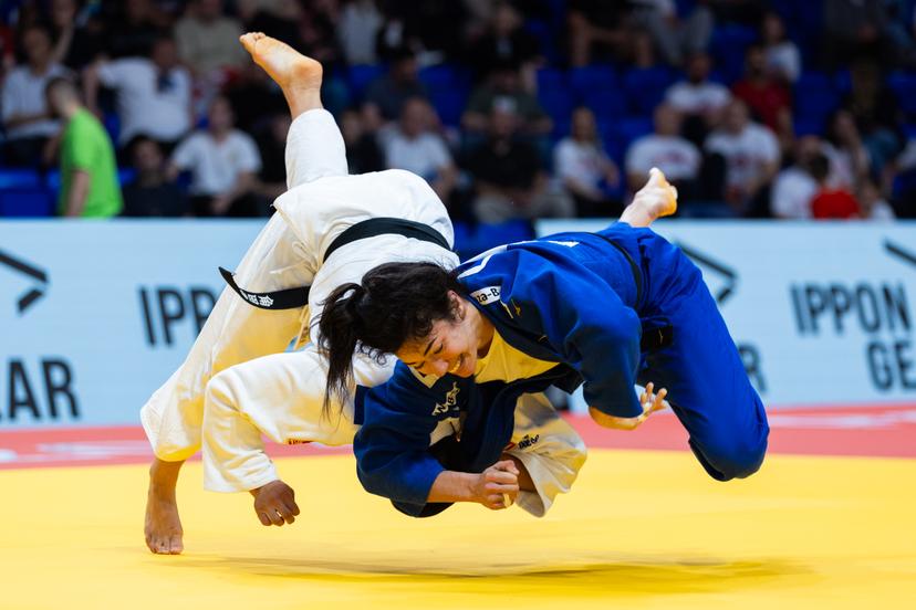 Belgian Gabriella Willems (blue gi) and Spanish Ai Tsunoda Roustant (white gi) pictured in action during a bout in the Women's -70kg category, at the European Judo Championships in Podgorica, Montenegro, on Friday 25 April 2025. The tournament is taking place from 23 tot 27 April 2025. BELGA PHOTO NIKOLA KRISTC