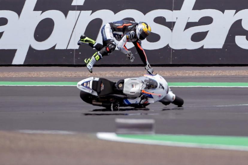 RW Racing GP Team's Belgian rider Barry Baltus crashes during the qualifying session for the Indonesian Grand Prix Moto2 race at the Mandalika International Circuit at Kuta Mandalika in Central Lombok on March 19, 2022.  BAY ISMOYO / AFP