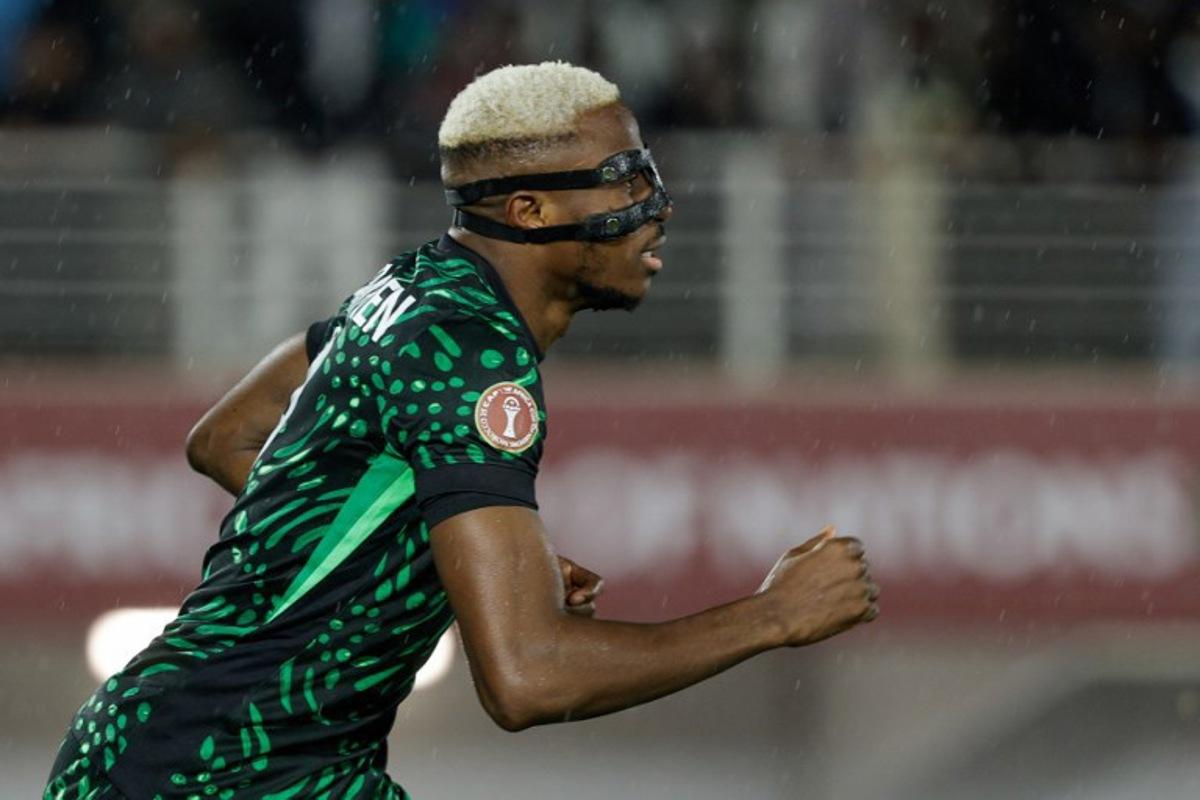 Nigeria's forward #09 Victor Osimhen runs during the Africa Cup of Nations (CAN) Group C football match between Nigeria and Tanzania at Fez Stadium in Fes on December 23, 2025.   Abdel Majid BZIOUAT / AFP
