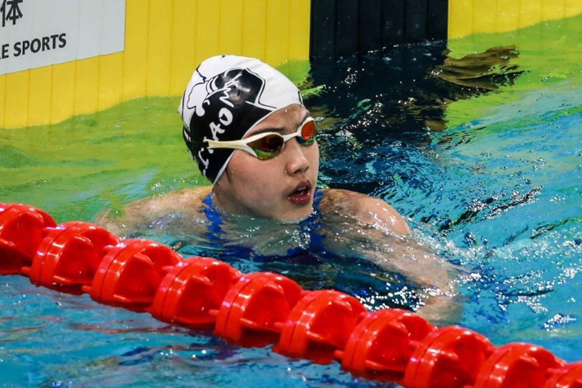China's Yu Zidi reacts after finishing the women's 200 meters freestyle semifinal at the 2025 National Swimming Championships in Shenzhen, in China's southern Guangdong province on May 19, 2025.  AFP