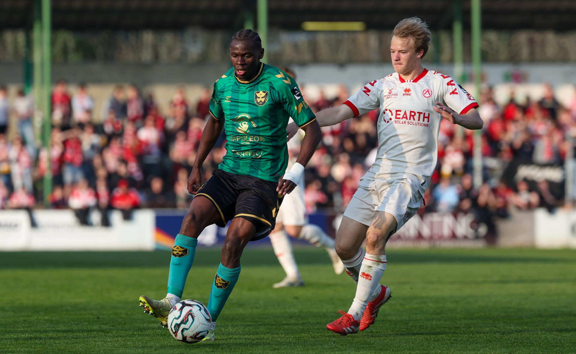 Francs Borains' Aboubacar Ali and Kortrijk's Liam De Smet fight for the ball during a soccer game between Royal Francs Borains and KV Kortrijk, Saturday 21 March 2026 in Boussu, on day 31 of the 2025-2026 'Challenger Pro League' 1B second division of the Belgian championship. BELGA PHOTO VIRGINIE LEFOUR