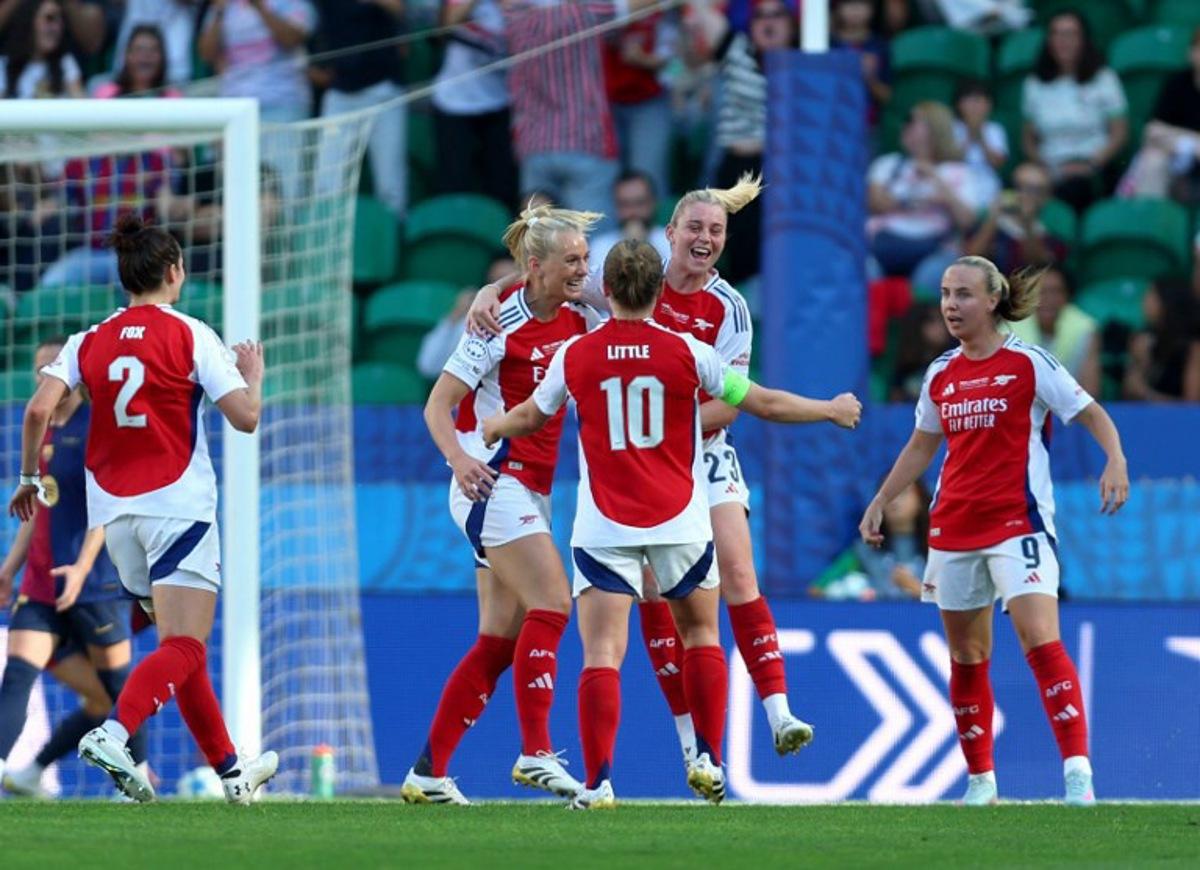 Arsenal's Swedish striker #25 Stina Blackstenius celebrates after scoring her team's first goal during the UEFA Women's Champions League final football match between Arsenal FC and Barcelona FC at Jose Alvalade stadium in Lisbon, on May 24, 2025.  FILIPE AMORIM / AFP