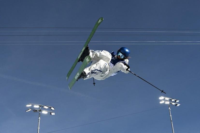 China's Gu Ailing Eileen competes in the freestyle skiing women's freeski halfpipe final run 2 during the Milano Cortina 2026 Winter Olympic Games at Livigno Snow Park, in Livigno (Valtellina), on February 22, 2026.  Jeff PACHOUD / AFP
