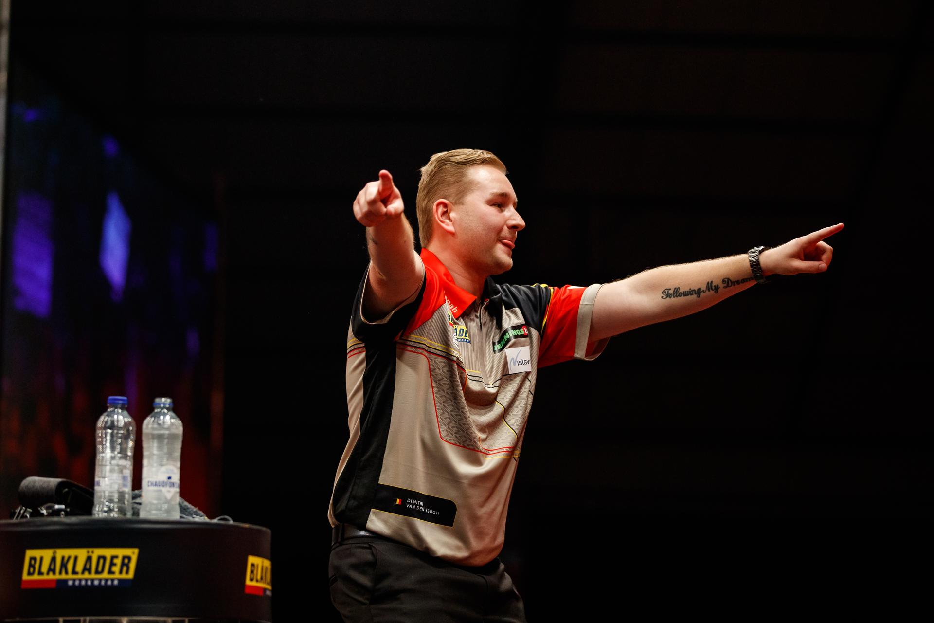 Belgian Dimitri Van den Bergh celebrates on the second day of the Belgian Darts Open, a tournament in the European Tour that takes places from September 23 until September 25 in Wieze, Saturday 24 September 2022. BELGA PHOTO JEF MATTHEE