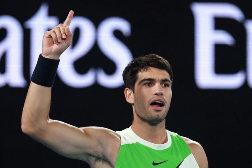 Spain's Carlos Alcaraz reacts after a point against Serbia's Novak Djokovic during their men's singles final match on day fifteen of the Australian Open tennis tournament in Melbourne on February 1, 2026.  DAVID GRAY / AFP