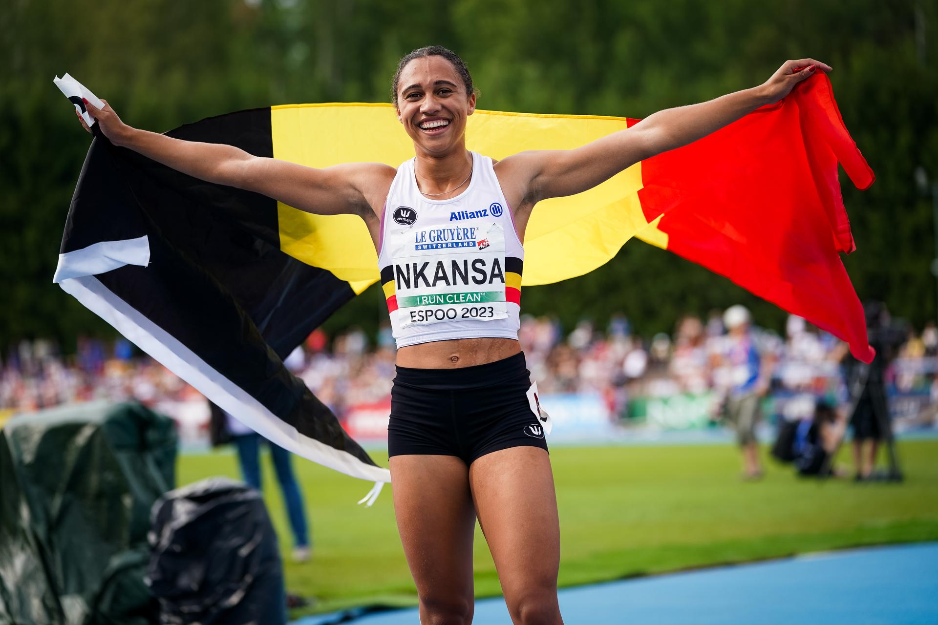 Belgian Delphine Nkansa celebrates after winning the 200m race on the fourth and final day of the European Athletics U23 Championships, Sunday 16 July 2023 in Espoo, Finland. The European championships take place from 13 to 17 July. BELGA PHOTO COEN SCHILDERMAN